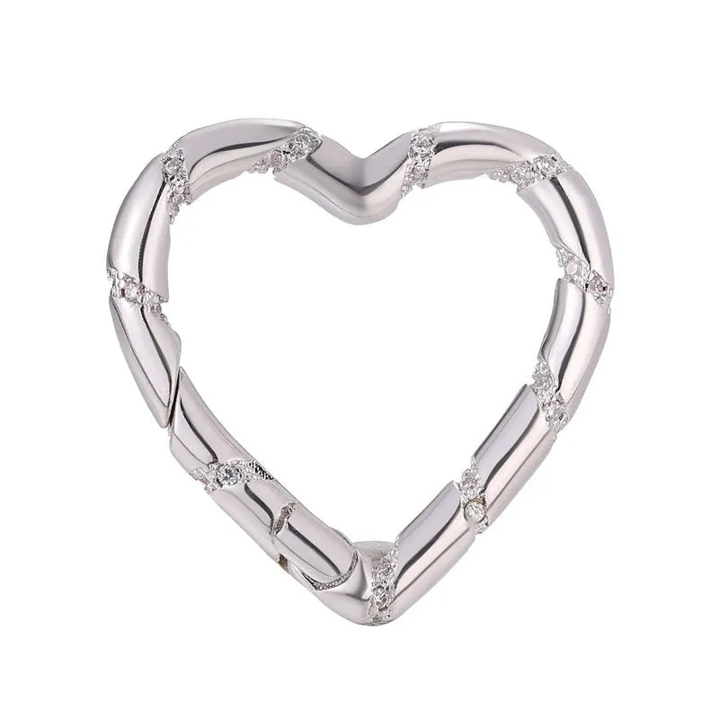 Copper climbing buckle with electroplated gold finish, shown as a heart spring fastener.
