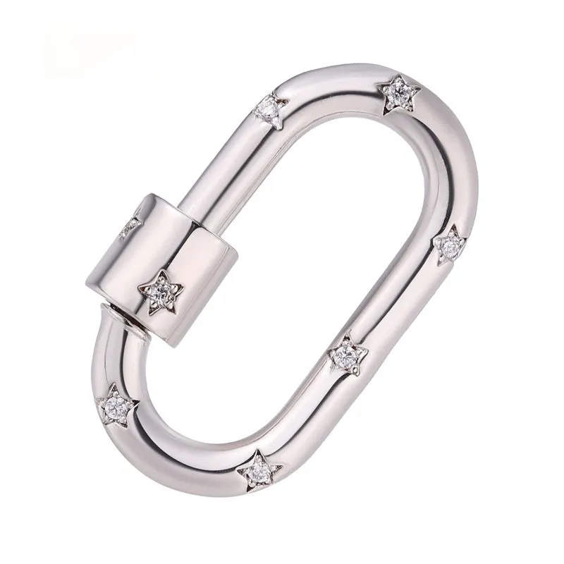Copper climbing buckle with electroplated gold finish, shown as a heart spring fastener.