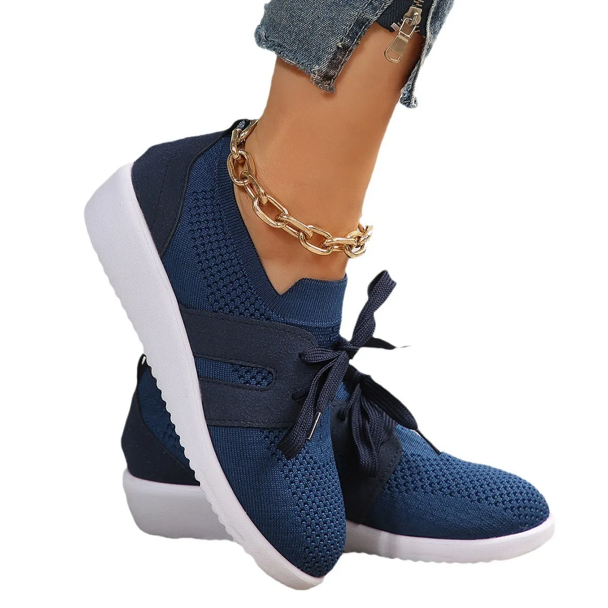 Casual women's sports shoes with mesh lining, rubber sole, front lace-up, low heel, round toe in black