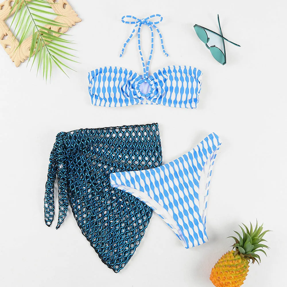 Women's striped three-piece swimsuit set with tube top, shorts, and waist skirt hem
