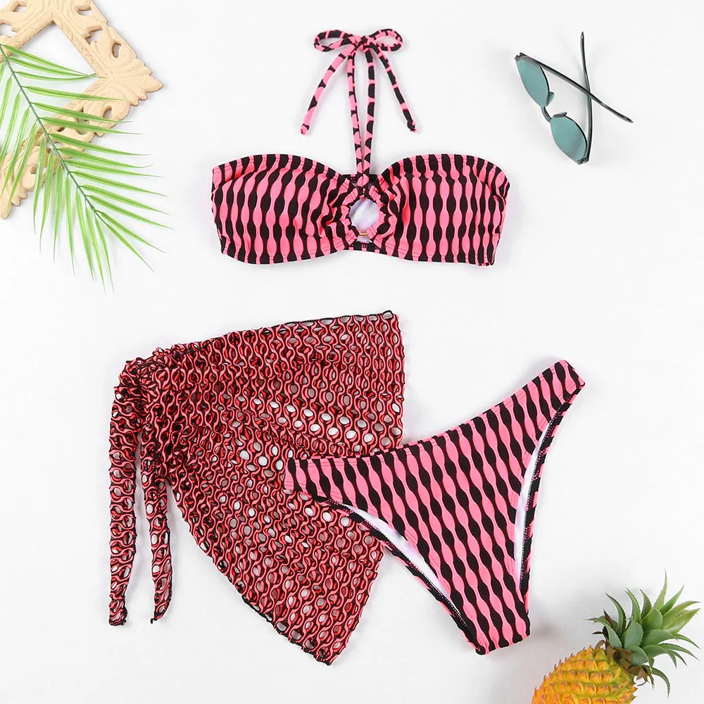 Women's striped three-piece swimsuit set with tube top, shorts, and waist skirt hem