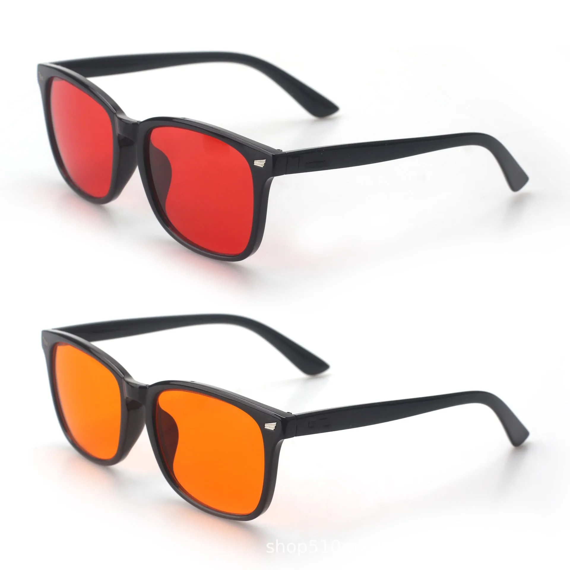 Orange red anti blue light UV glasses with black PC frame on a colour box