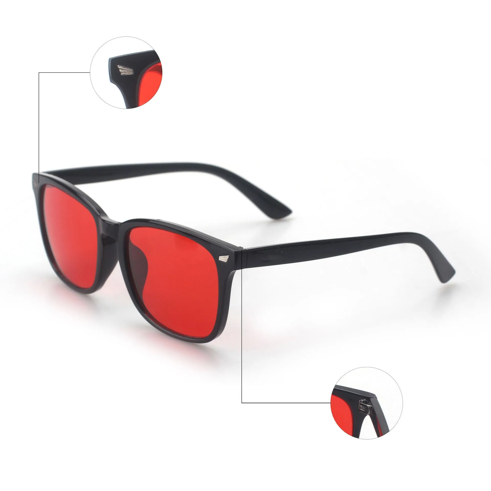 Orange red anti blue light UV glasses with black PC frame on a colour box
