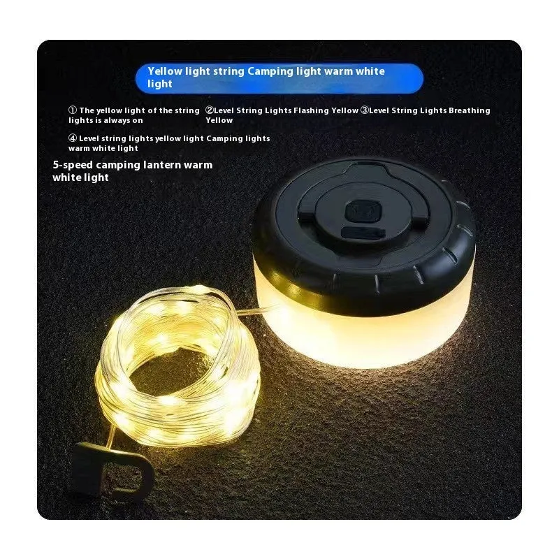 Charging multifunctional camping lantern with warm and colourful light modes on a campsite table
