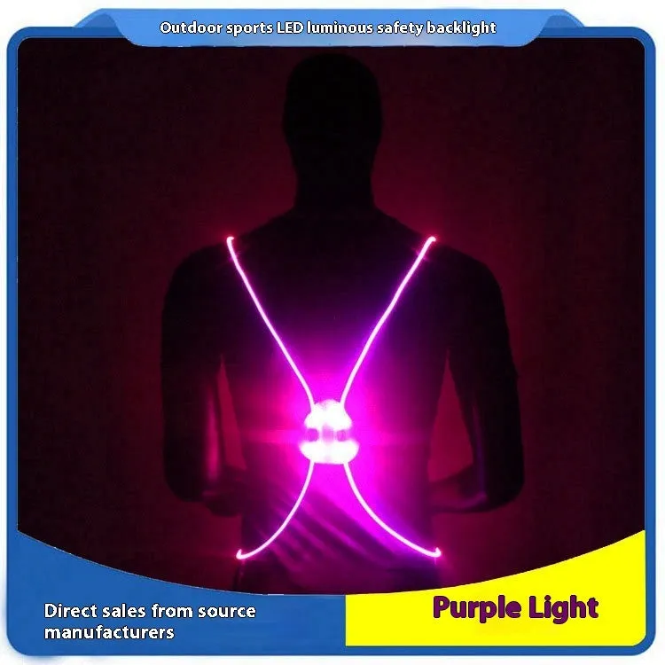 Red reflective vest with LED fibre optic lights visible on a person cycling at night