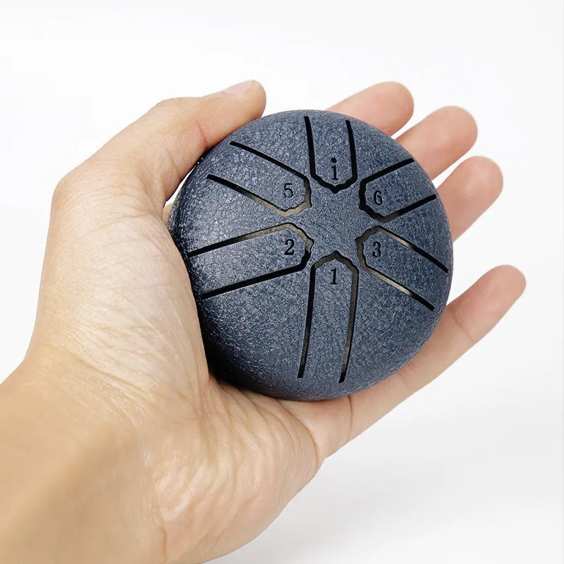 3-inch carbon steel tongue drum with six tone tongues, available in multiple colours