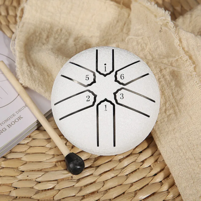 3-inch carbon steel tongue drum with six tone tongues, available in multiple colours