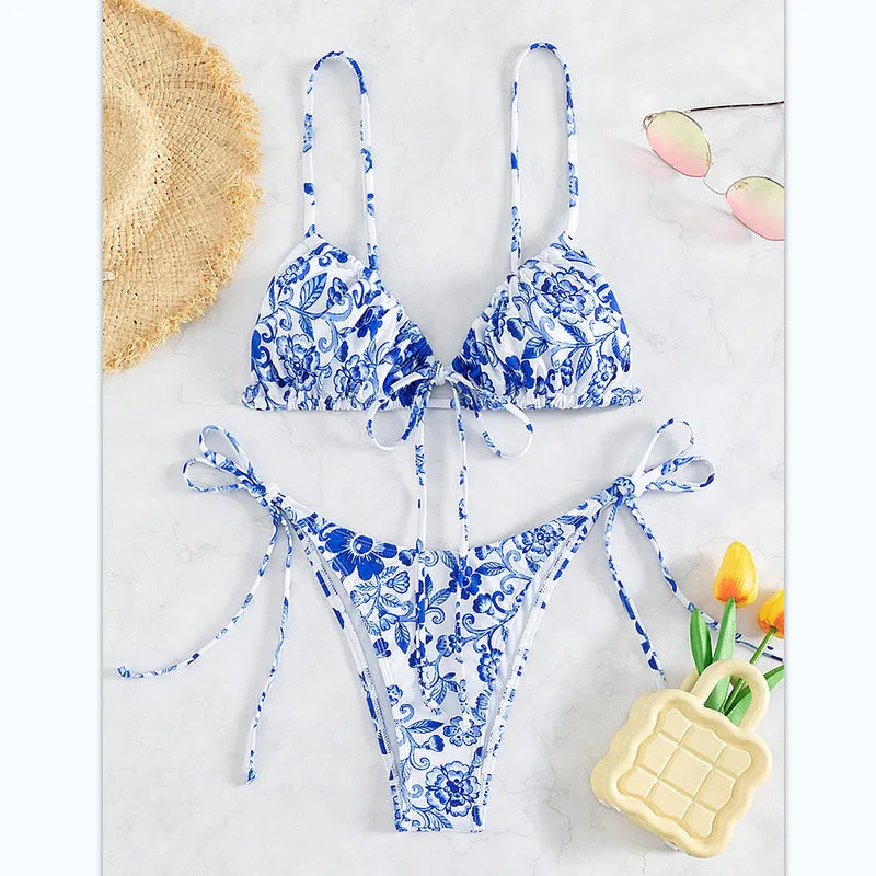 Women's blue and white floral print high-waist bikini set with triangle top and briefs