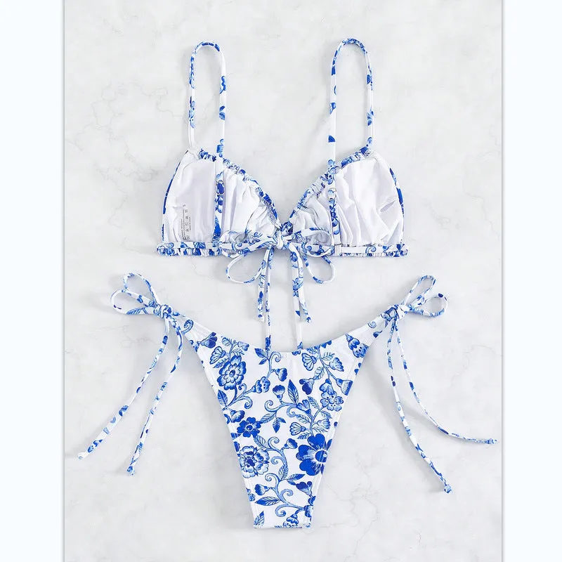 Women's blue and white floral print high-waist bikini set with triangle top and briefs