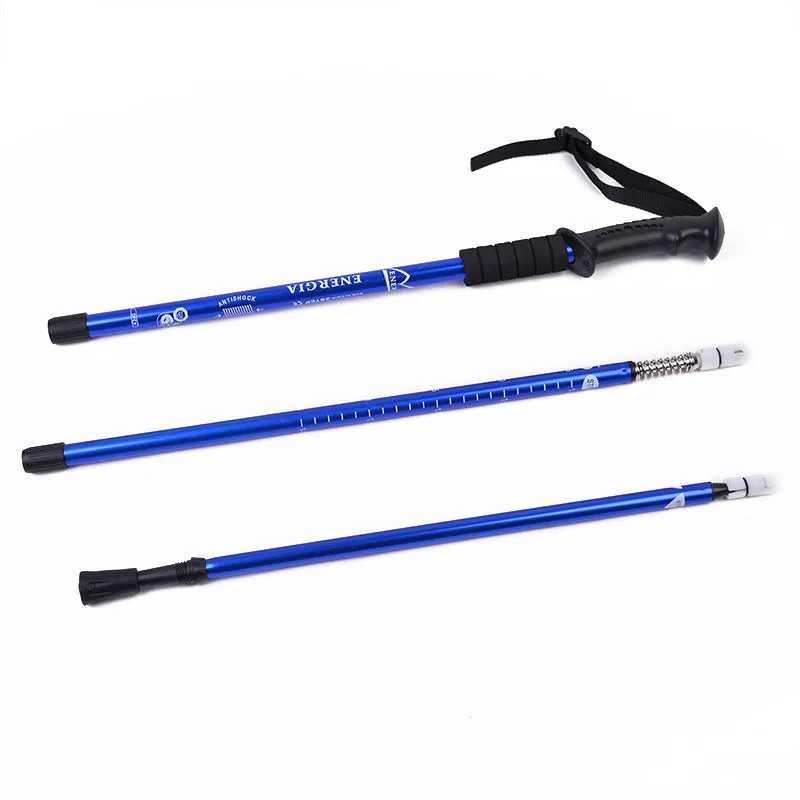 Retractable aluminium alloy walking stick with straight handle, adjustable 65cm to 135cm, in blue on green grass
