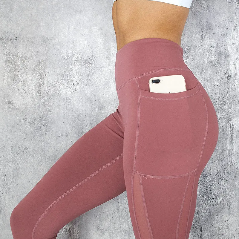 Women high waist fleece leggings with pockets in black solid colour nine-length