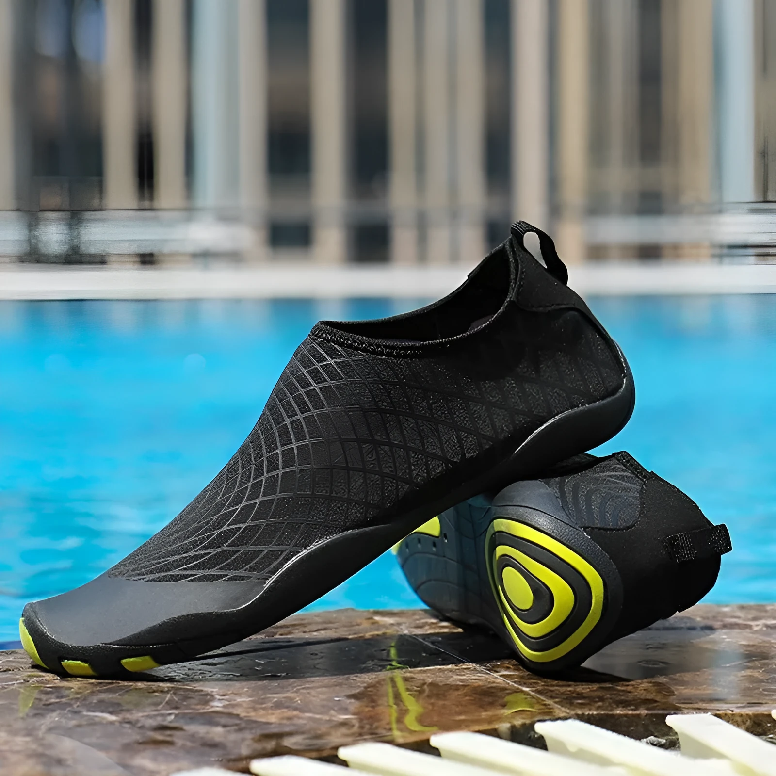 Children's black snorkeling socks and river shoes with natural rubber outsole and mesh upper