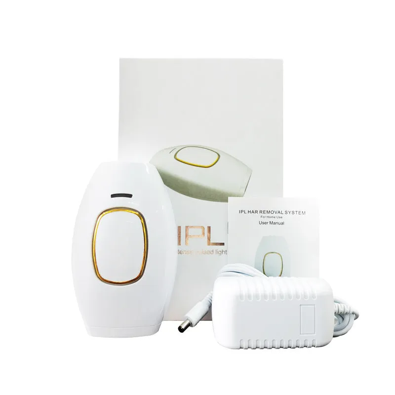 Whole body laser hair removal instrument in white with charger and manual on a colour box