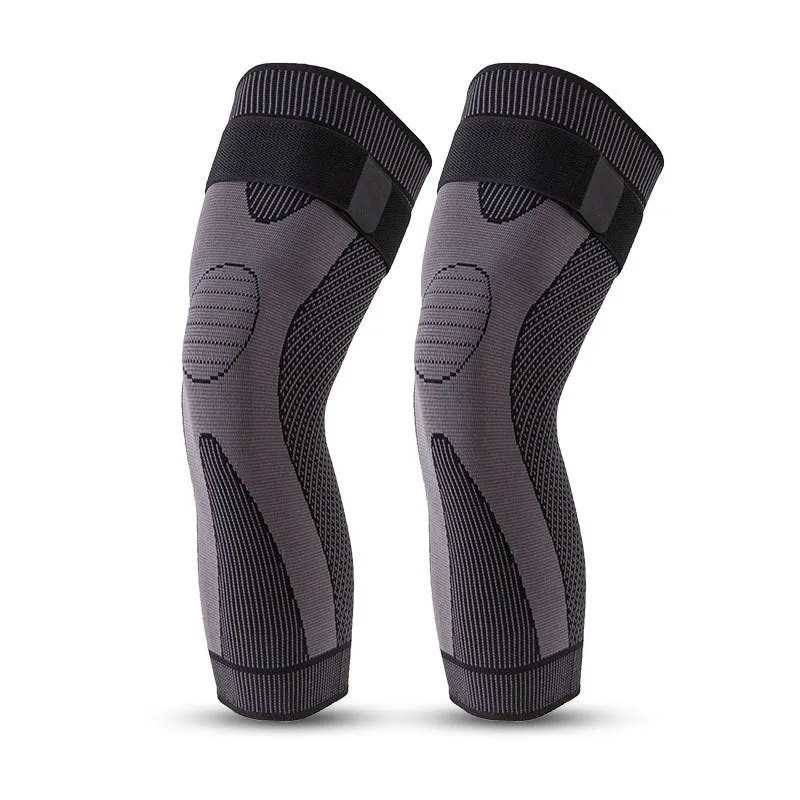 Green long straps knee pads with non-slip leggings for sports protection on a white background