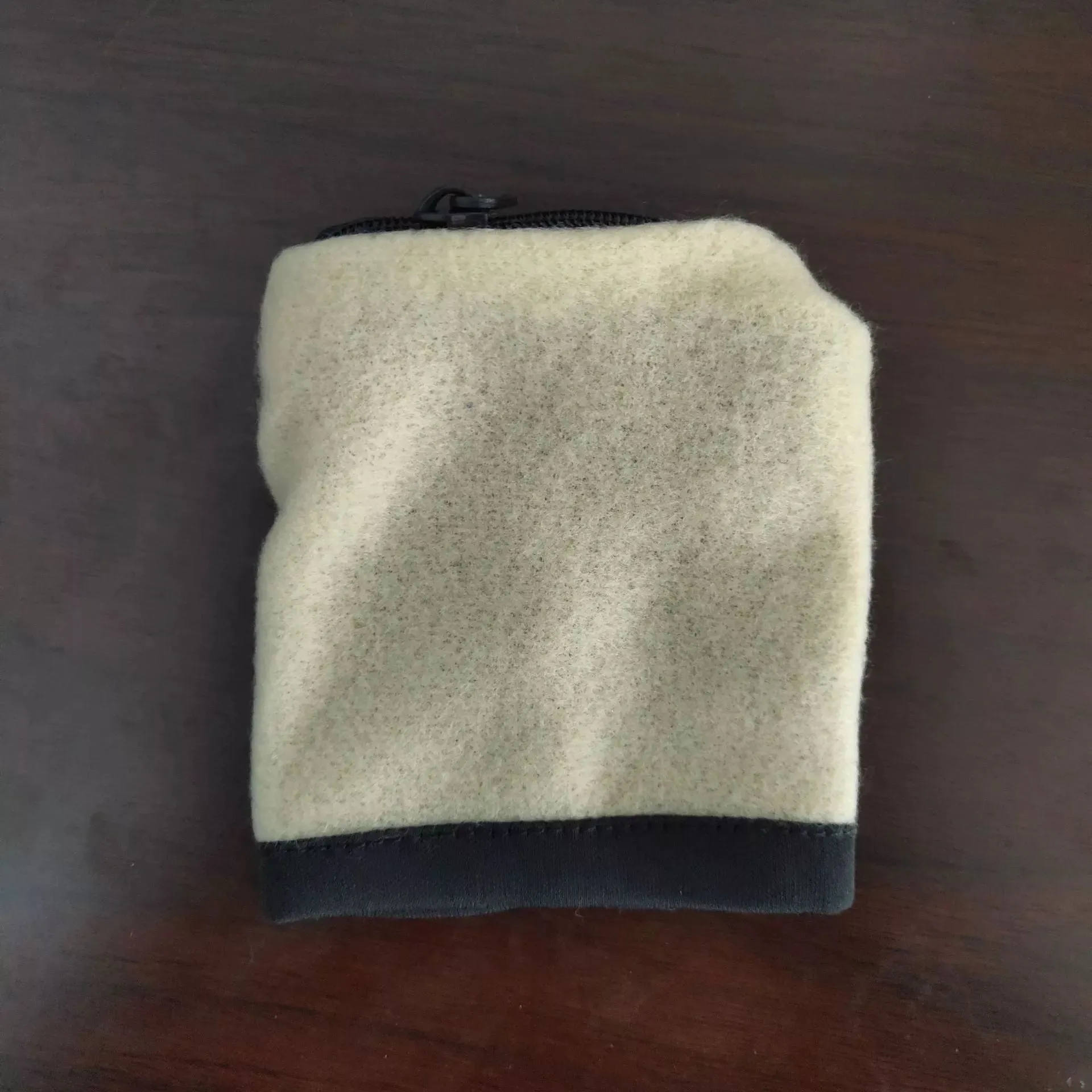 Sport phone arm bag wristband pocket in black with phone inserted, 10x12cm size