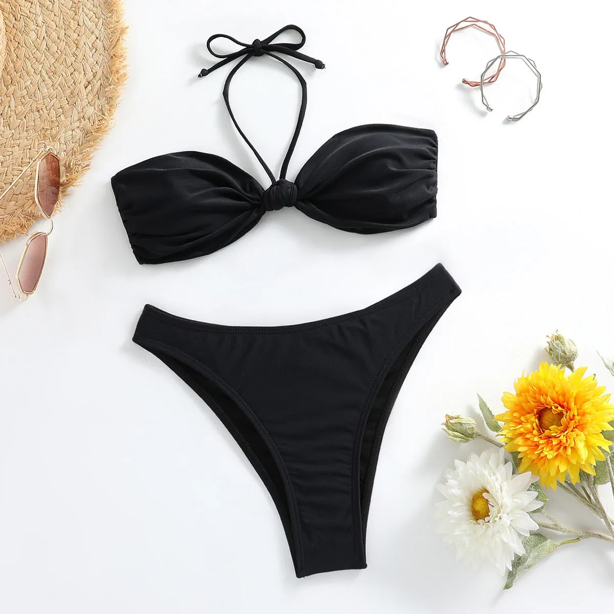 Black women's bikini set with lace-up tube top and matching briefs