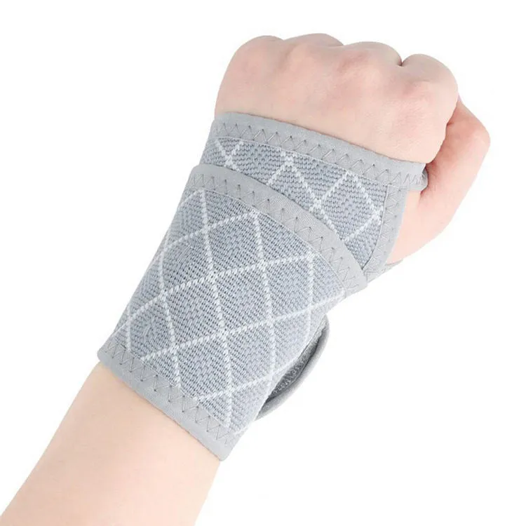 Adjustable wrist brace for carpal tunnel support, black unisex design with hook-and-loop strap