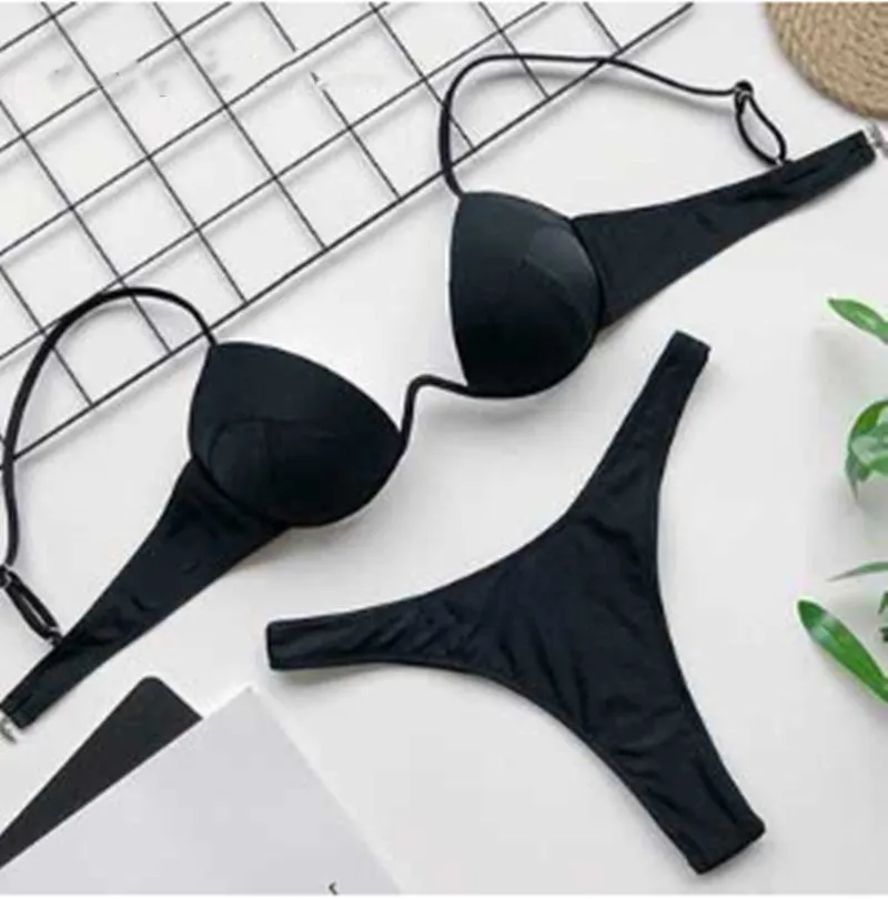 Gle Swimwear women's plain polyester swimsuit in black with simple bra style and mid-waist cut