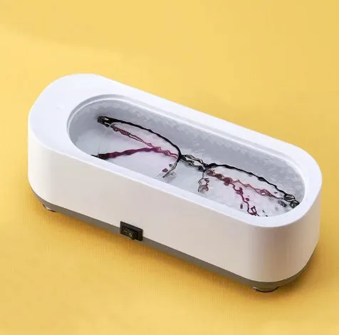 White ultrasonic glasses washing machine with compact design, USB power, and 200g weight
