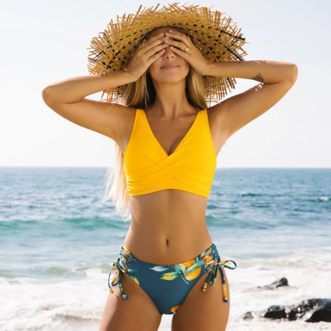 Yellow nylon cotton blend high elasticity bikini swimsuit for women, sleeveless brief style