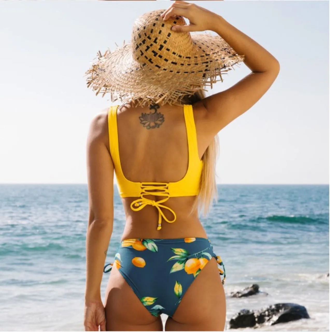 Yellow nylon cotton blend high elasticity bikini swimsuit for women, sleeveless brief style