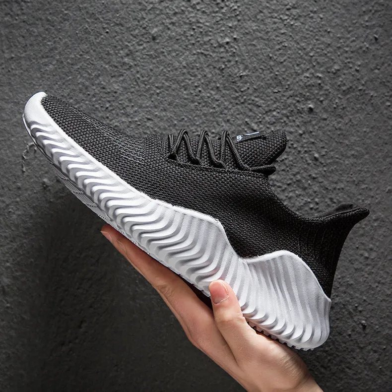 Men's large size breathable ultra-light running shoes in black with MD sole and sewn detailing