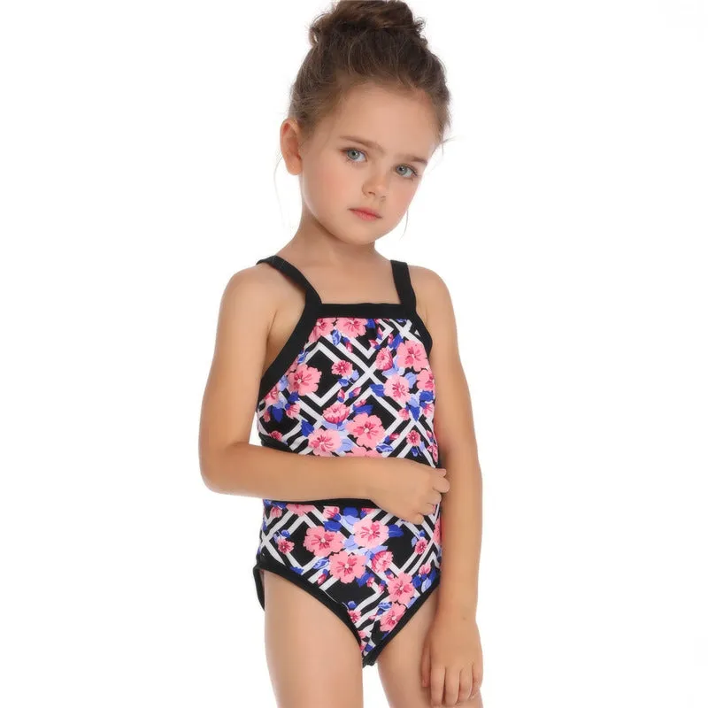 Women's blue nylon swimsuit with Japanese floral pattern, front view