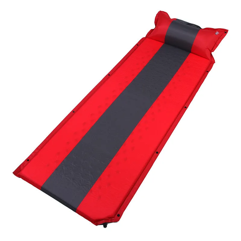 Outdoor automatic inflatable camping mat for one person with memory foam filling, blue and grey colour, shown on grass