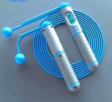 Intelligent counting skipping rope with ABS handle and weight-bearing balls on black yellow background