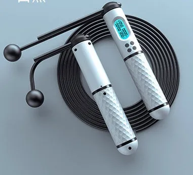 Intelligent counting skipping rope with ABS handle and weight-bearing balls on black yellow background