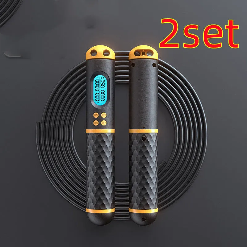 Intelligent counting skipping rope with ABS handle and weight-bearing balls on black yellow background