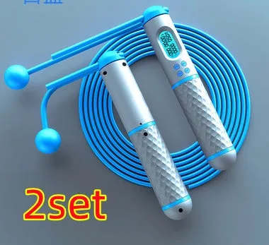 Intelligent counting skipping rope with ABS handle and weight-bearing balls on black yellow background