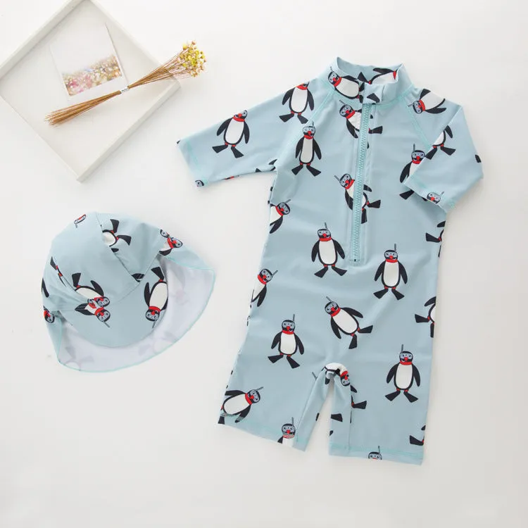 Boy's long sleeve penguin print swimsuit two-piece set with matching swimming cap
