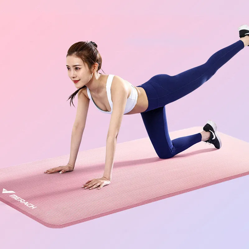 Widened blue TPE yoga mat 183x61cm on floor for home fitness stretching