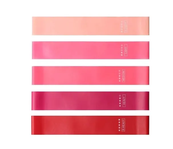 Five pink gradient latex yoga tension bands with varying thickness for resistance training