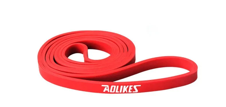 Natural latex rally resistance band in multiple colours: red, black, purple, green, and blue