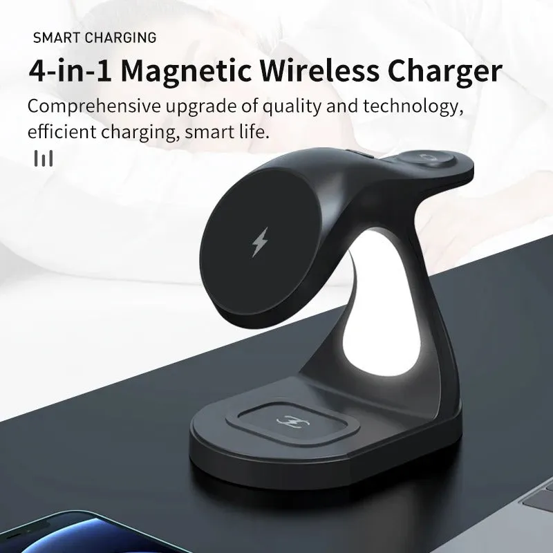 Fast Four In One Magnetic Wireless Fast Charger in black with phone, earphones, and watch placed on charging areas