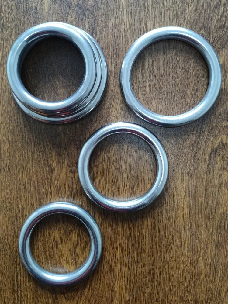 Electroplated carbon steel Wing Chun training ring for forearm strength, shown in three sizes.