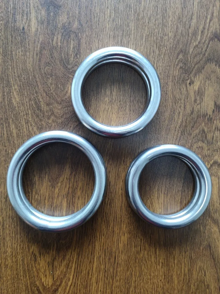 Electroplated carbon steel Wing Chun training ring for forearm strength, shown in three sizes.