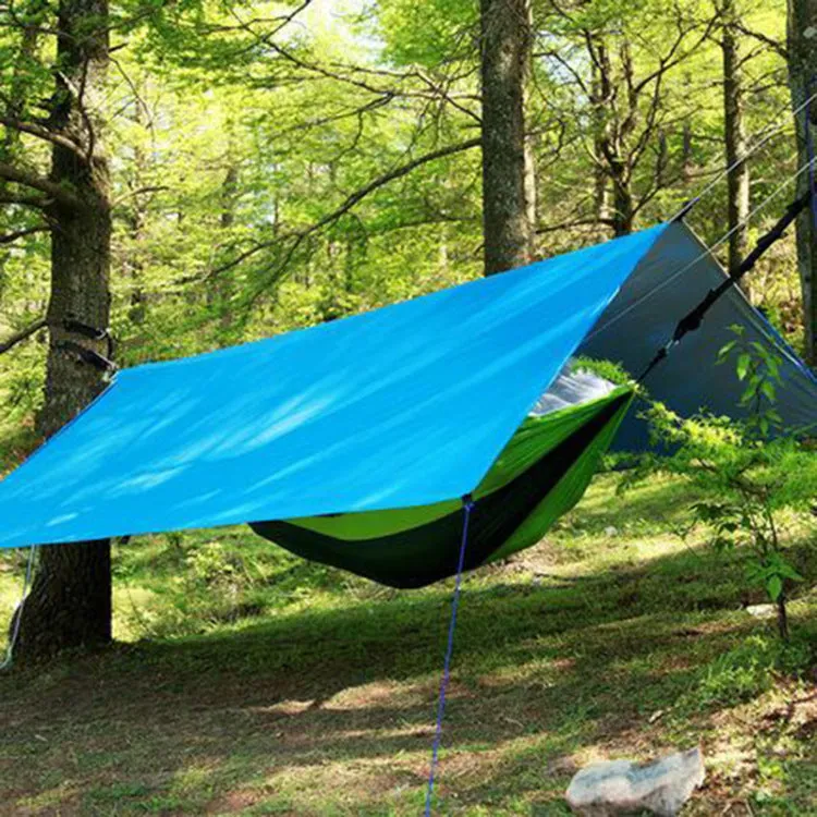 300x300cm awning sun shelter made of waterproof Oxford fabric in army green, set up outdoors with wind ropes