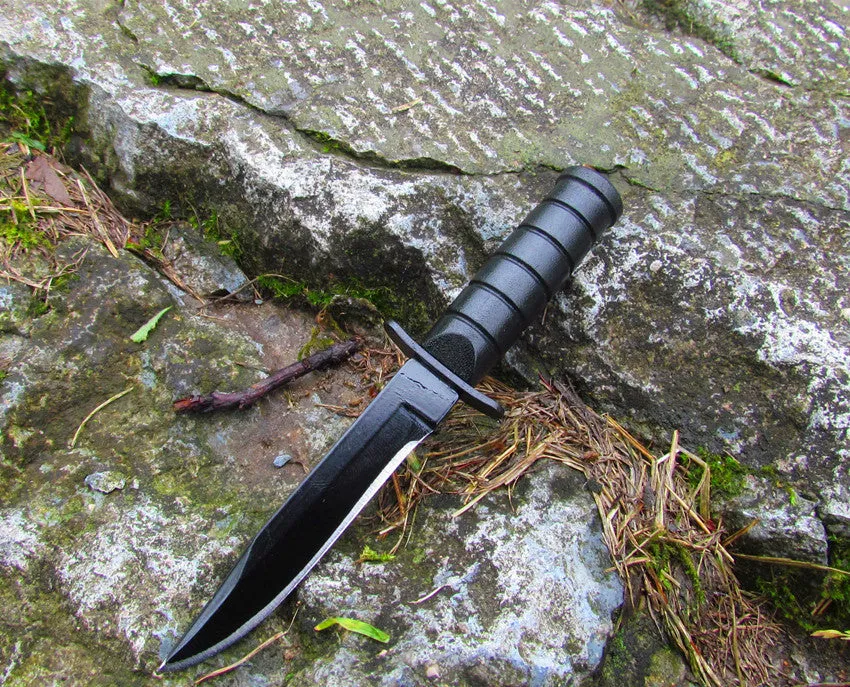 Stainless steel camping survival knife with black aluminium alloy handle on white background