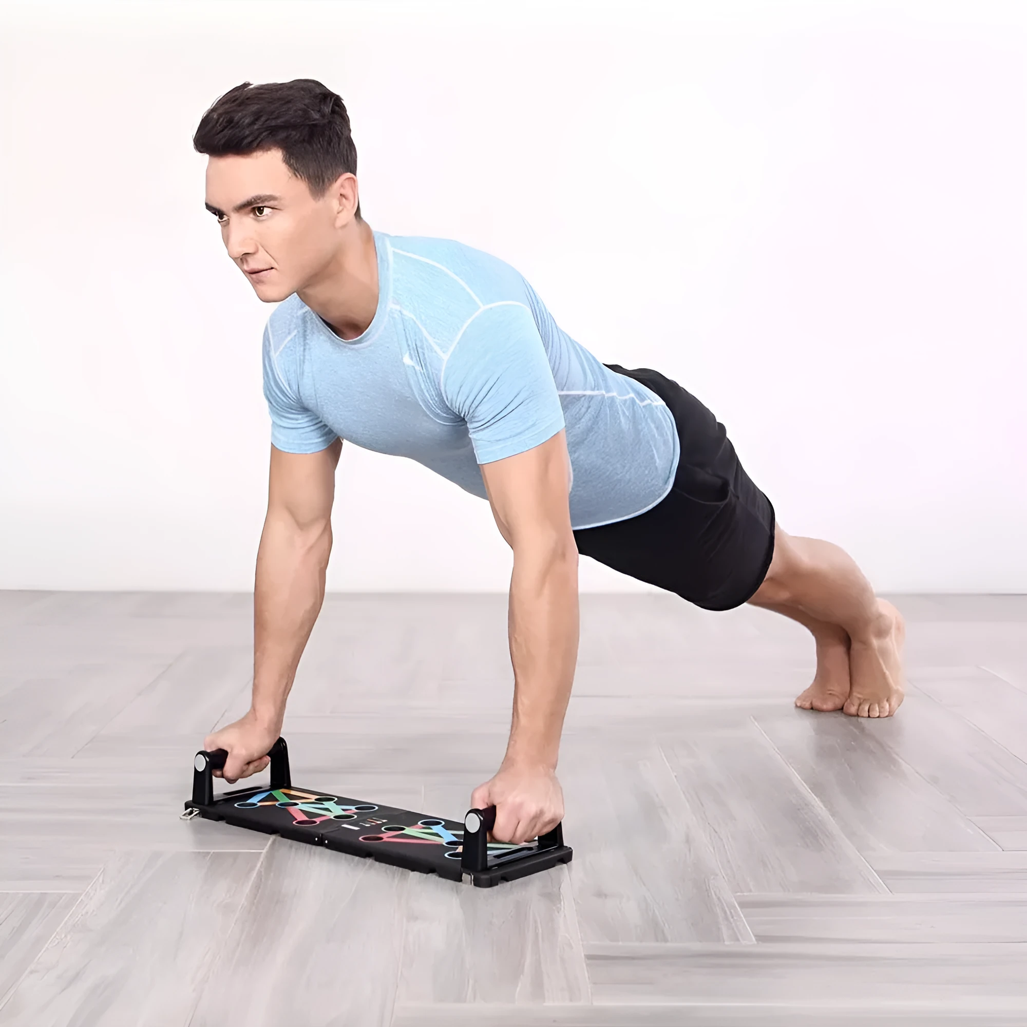Yunmai push-up stand in black with two armrests and support board on floor