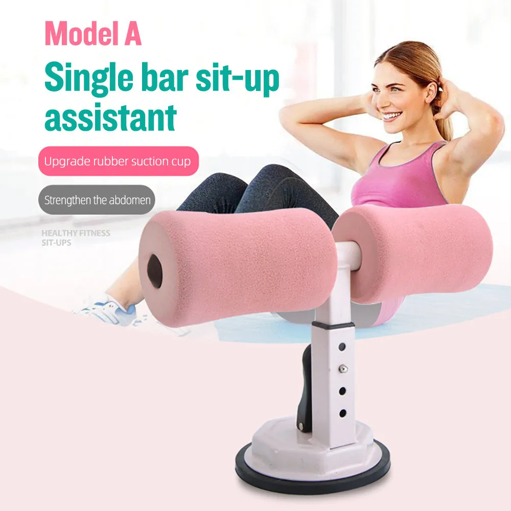 Pink adjustable sit-up bar floor assistant with foam pad and suction base on smooth floor
