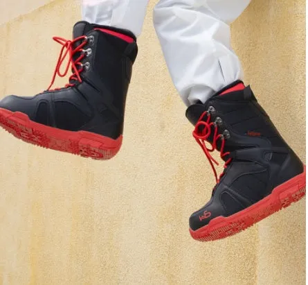 Men's black ski boots with tie laces, rubber outsole, and EVA midsole on a white background