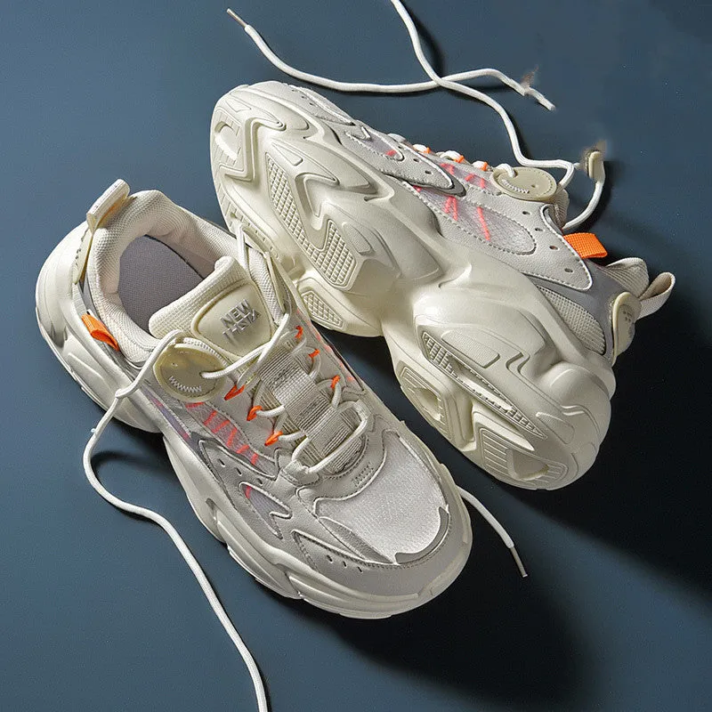 Men's PU running sports shoes in beige with stitching detail, side view