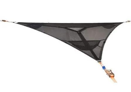 Black polyester portable multi-person triangle hammock lying on grass with trees in background