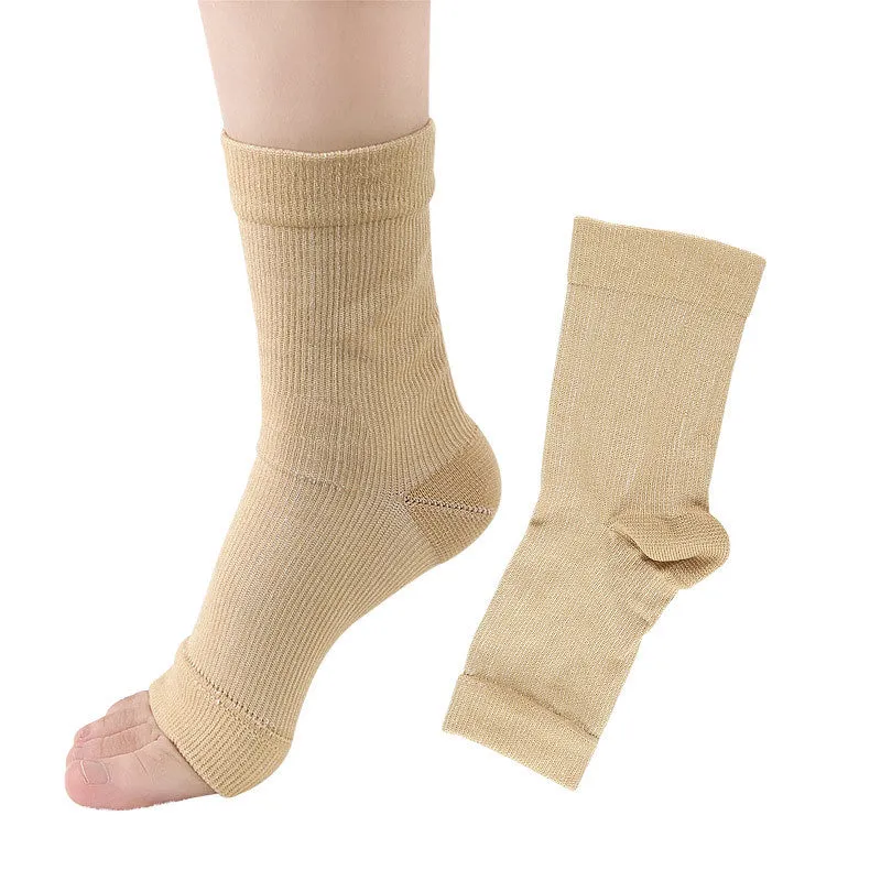 Open-toe compression foot sleeves in white and black nylon spandex with arch and ankle support for sports