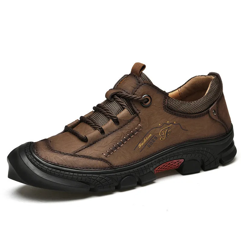 Non-slip wear-resistant hiking boots in black with leather upper and rubber sole for outdoor cross-country use