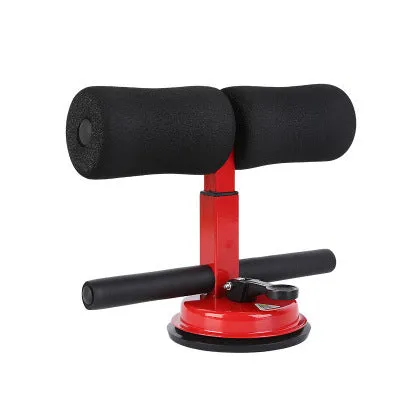 Sit-up auxiliary home fitness equipment abdominal muscle clamp in black with foam padding on a mat