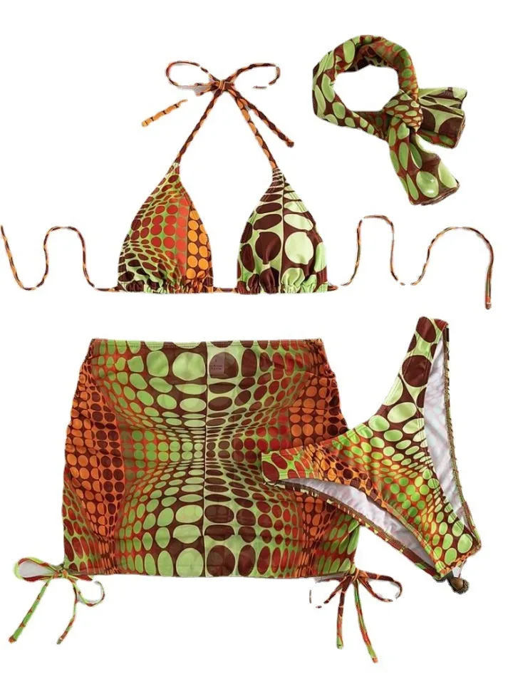 Printed split bikini set with chest pad, shorts, skirt, and headband in polyester on woman